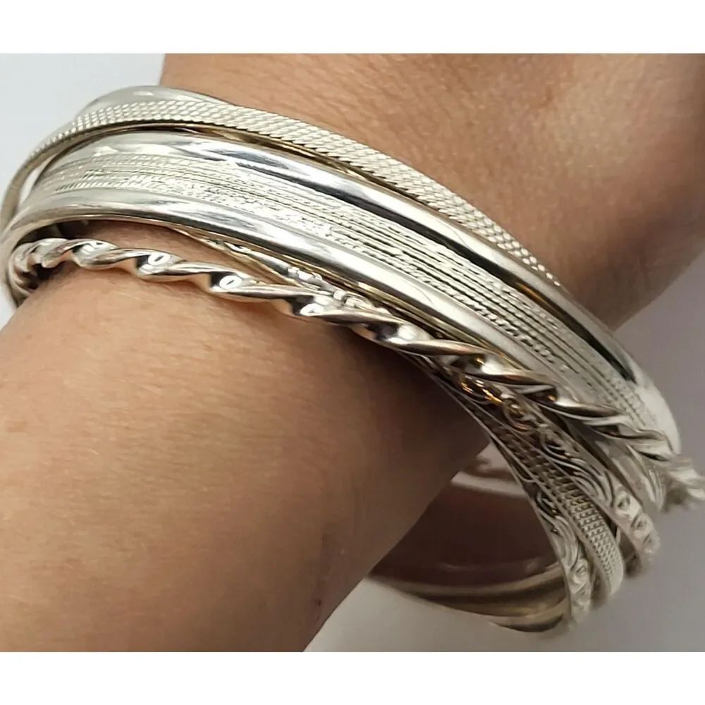 Set of 7 Interlocking Sivertone Bangle Bracelets 2.6in dia